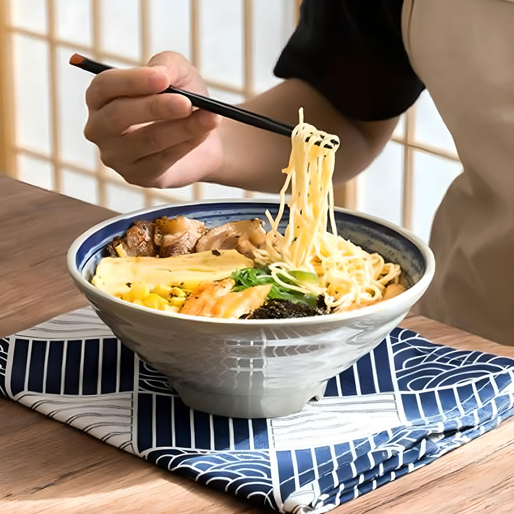 Eating Noodles In Kakushin Ramen Bowl